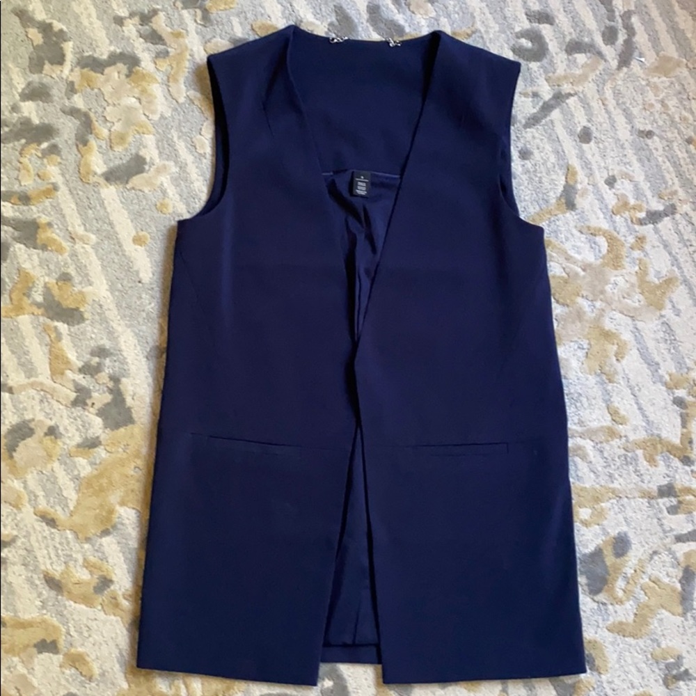 White/Black vest size 8